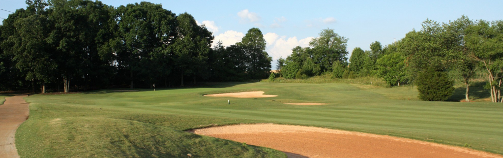 View of golf course with bunkers