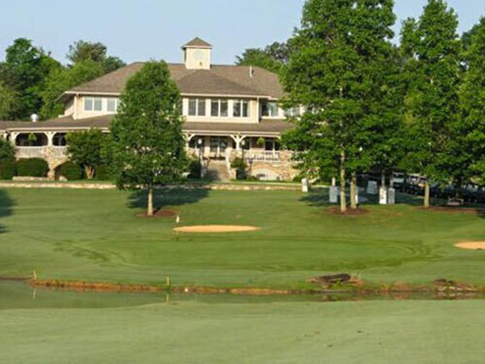 Golf course clubhouse with trees